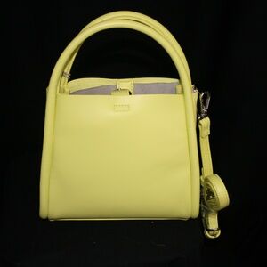 a new day. Small  crossbody bag with detachable strap in bright yellow